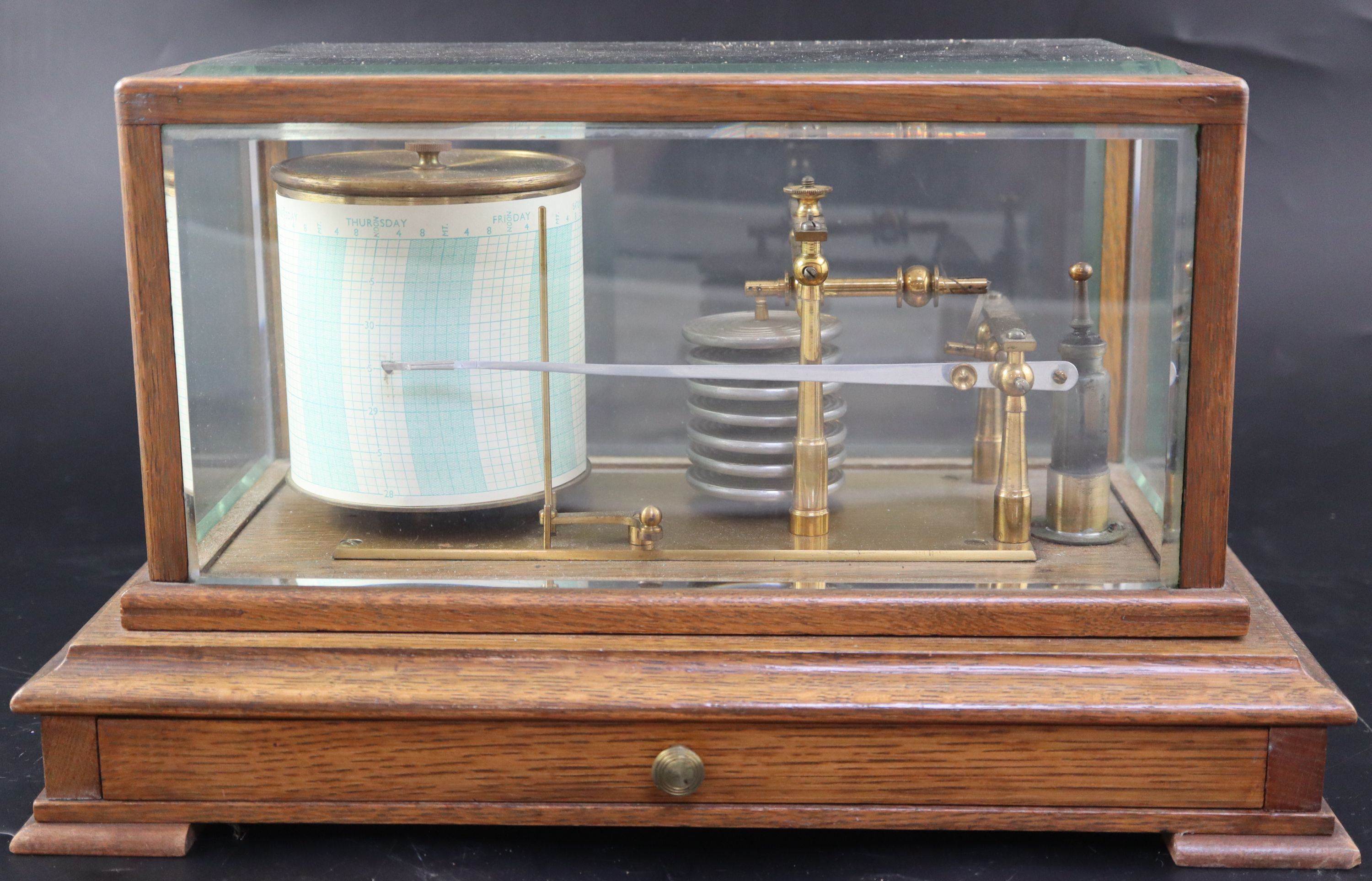 An Edwardian oak cased barograph, in bevelled glass case, width 36.5cm depth 22cm height 21cm